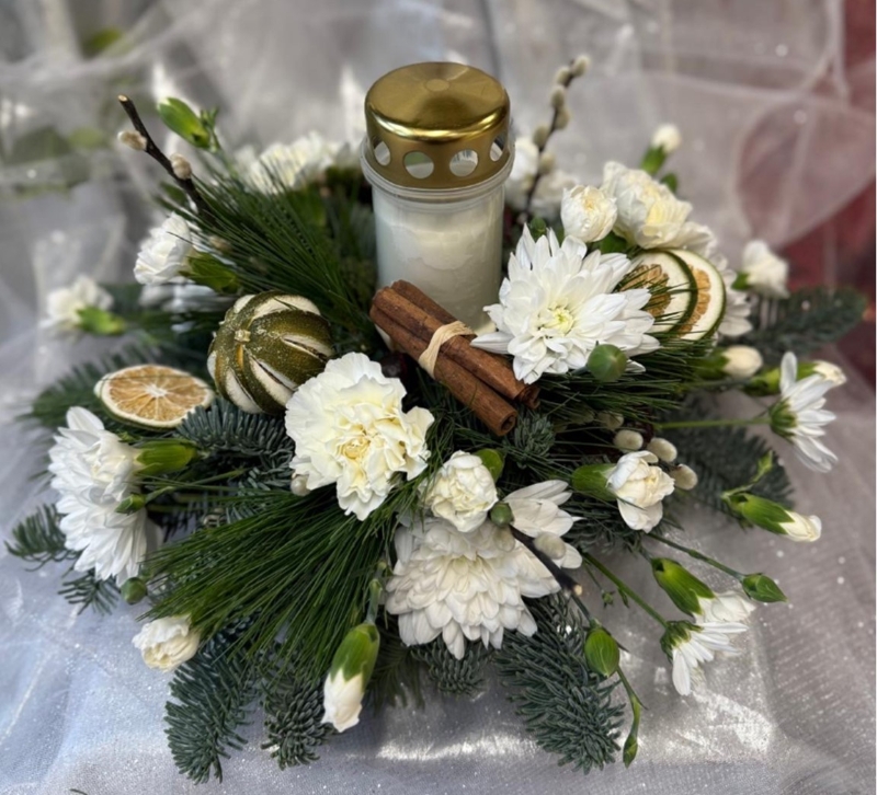 Christmas Grave arrangement with outdoor candle